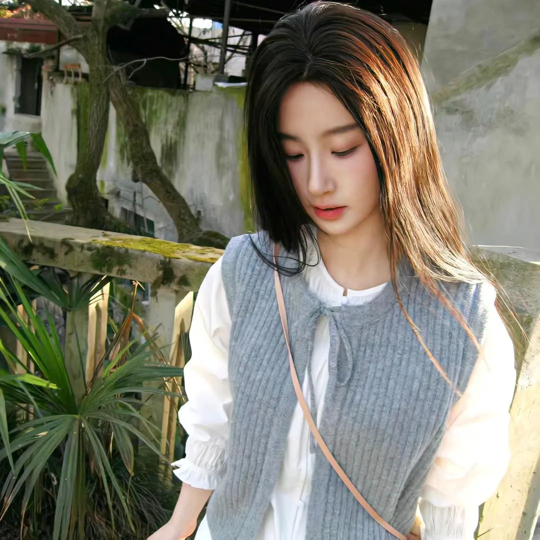 彼女
